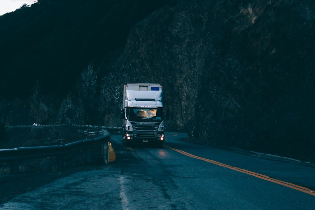 Semi truck traveling on the highway, representing a new motor carrier starting operations